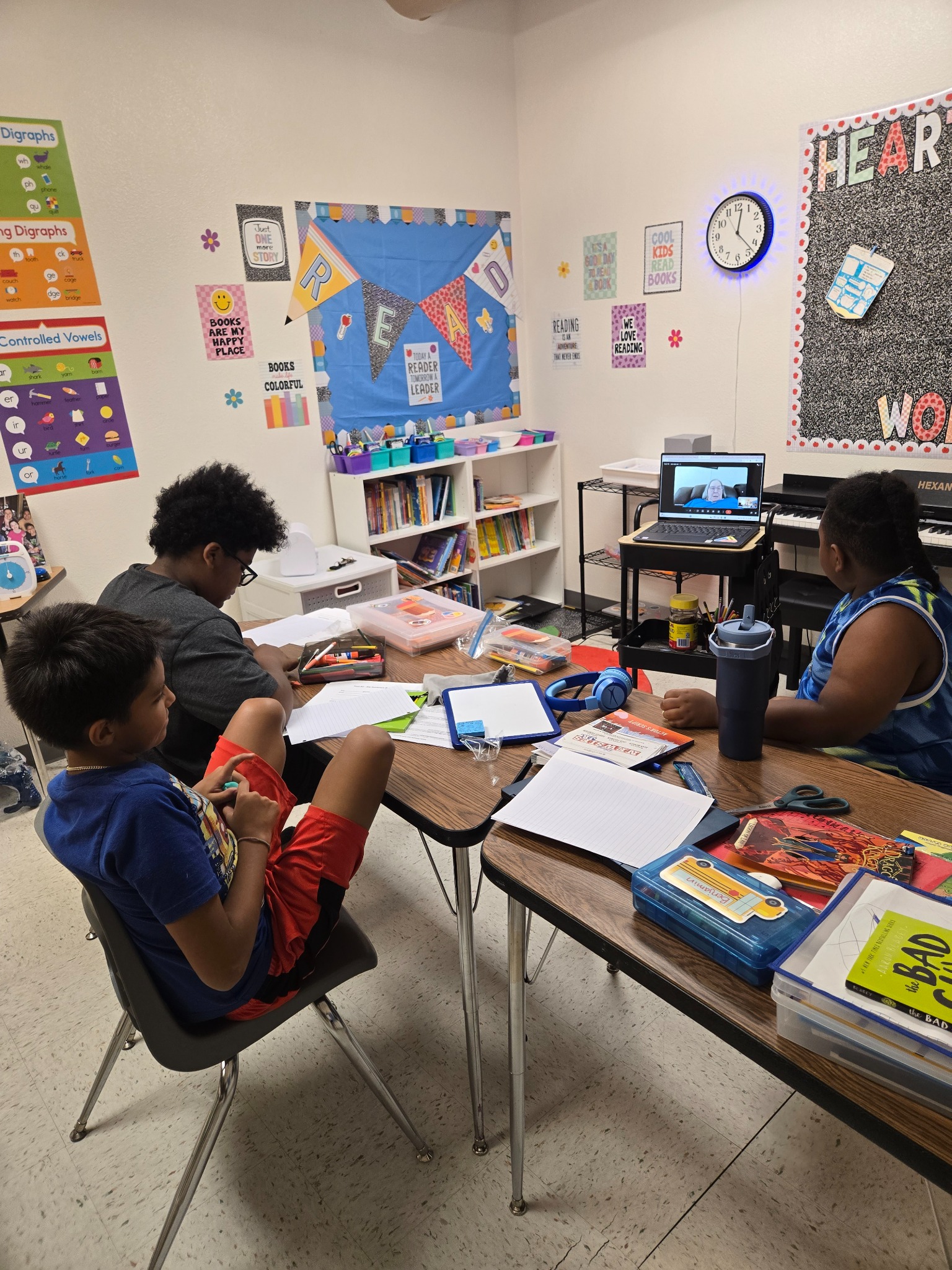Heart Filled Academy students working on writing activities during a virtual instructor-led Writing Lab